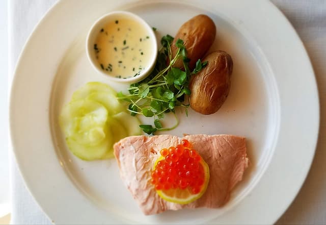 Poached Salmon with Creamy Chive Sauce and Pickled Cucumbers