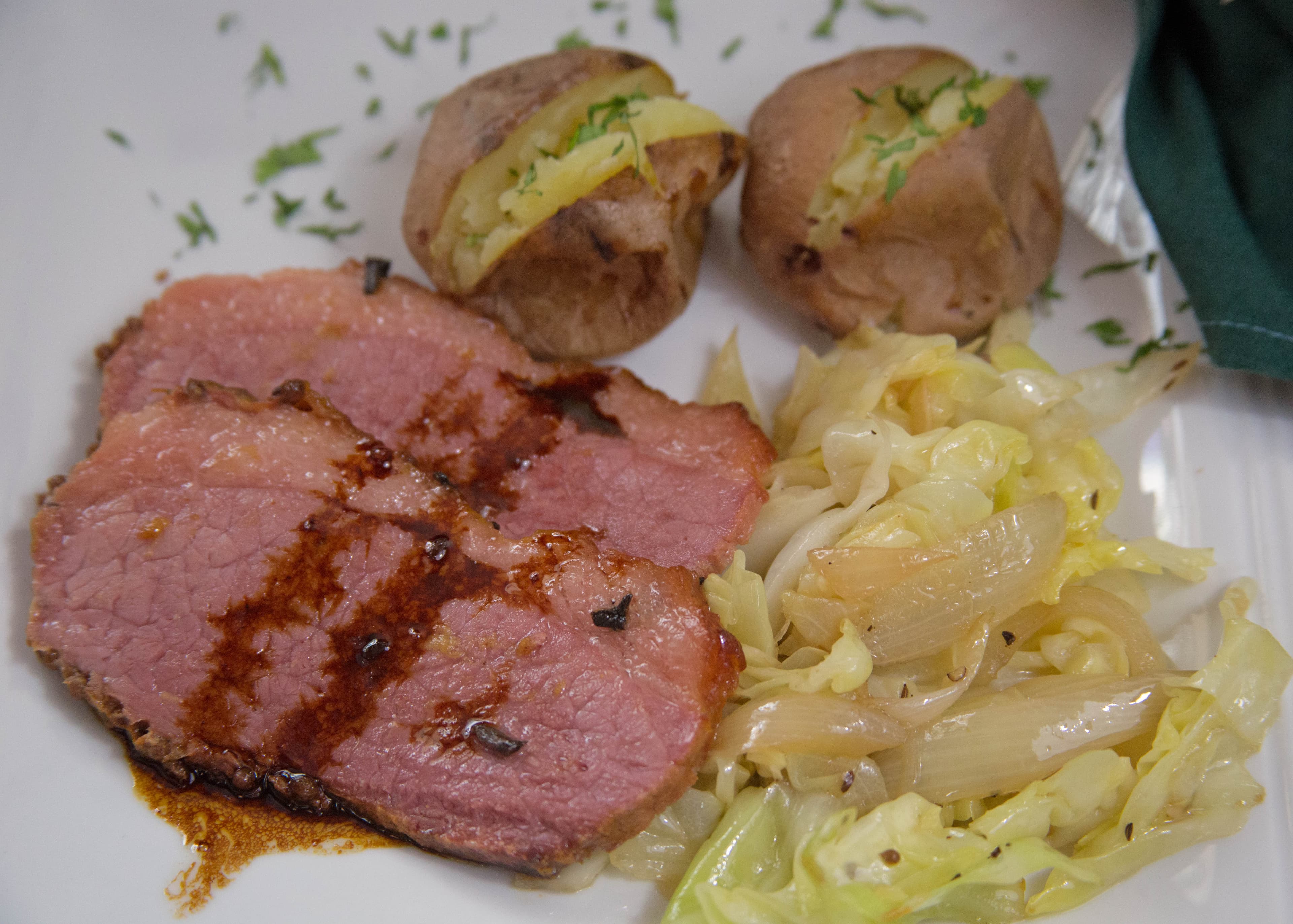 Baked Corned Beef with Sauteed Cabbage and Baked New Potatoes...