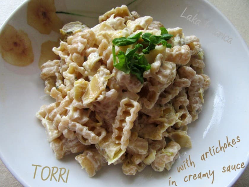 Torri pasta with artichokes in creamy sauce
