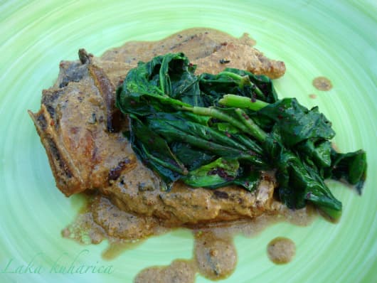 Pork chops with cider and spinach