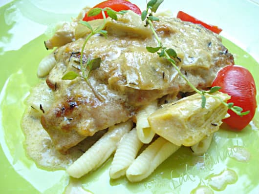 Scallops in cream sauce with artichokes