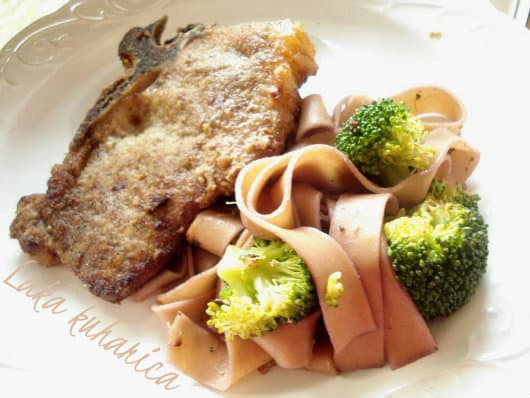 Veal cutlets with spiked pasta