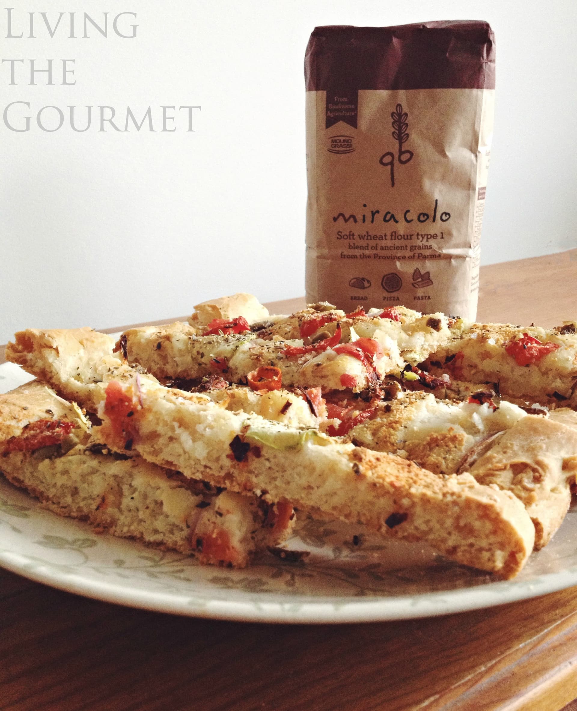 Focaccia with fresh tomato, zucchini & Kalamata olives