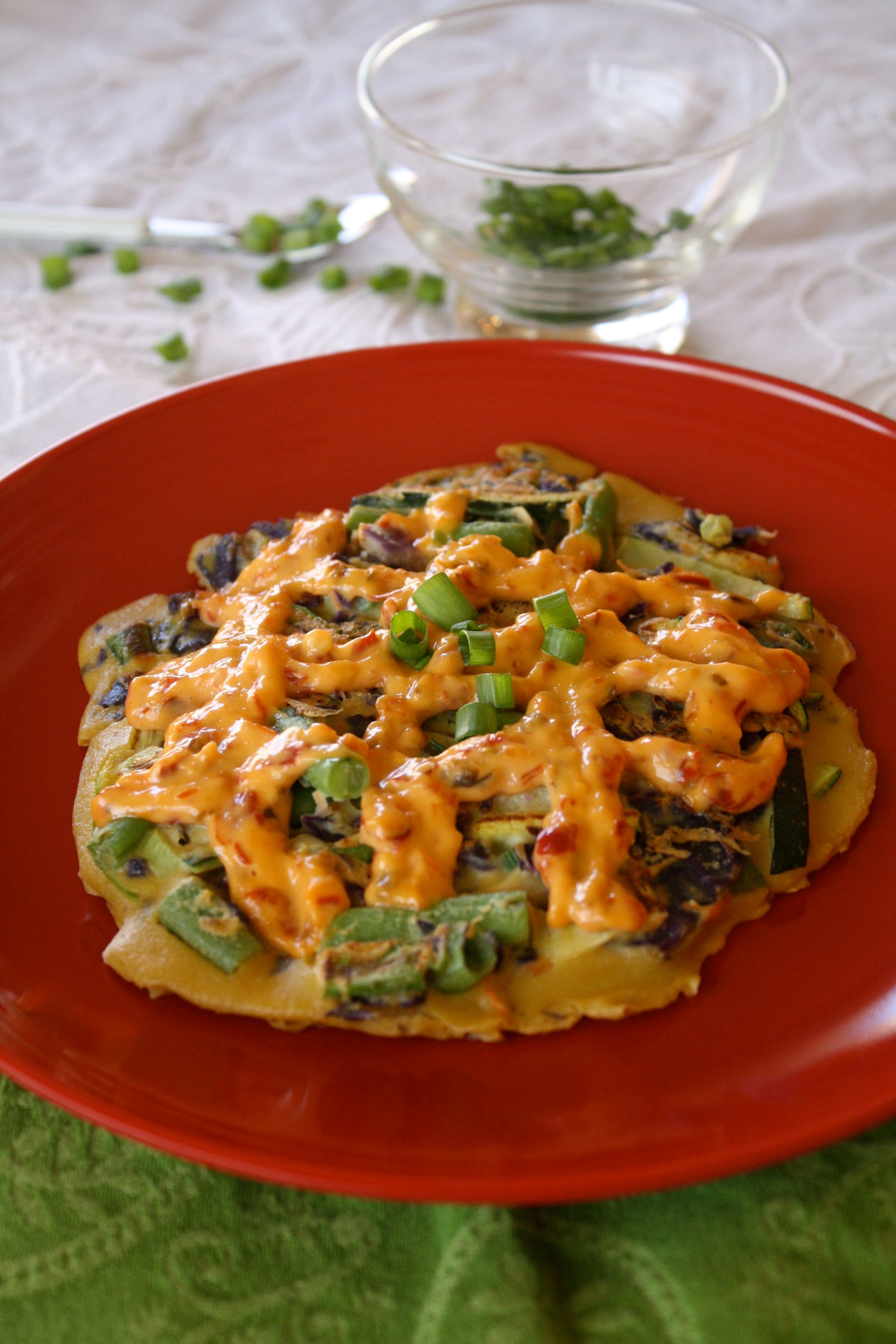 Okonomiyaki ("Japanese pancakes" or "Japaneses pizza")