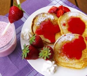 Pancakes with strawberry sauce