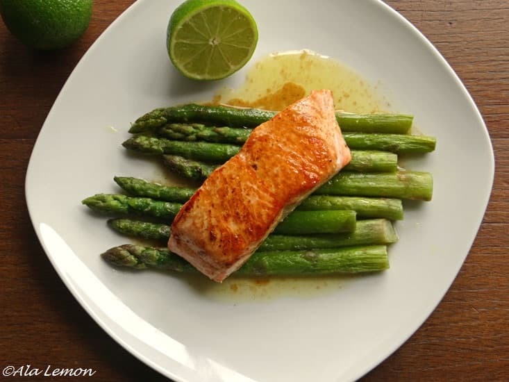 Pan-seared salmon with brown butter lime sauce and roasted asparagus