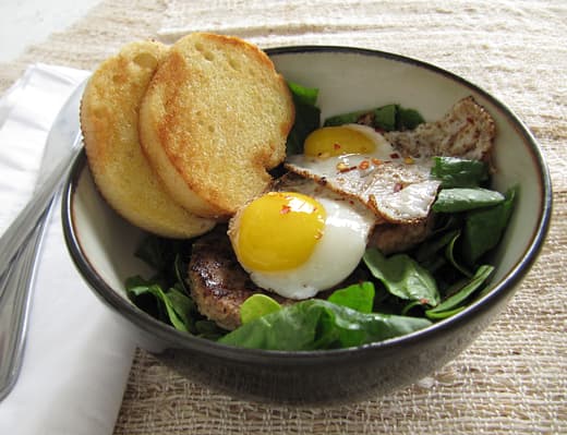 Sausage, Spinach, and Quail Egg Breakfast Salad 