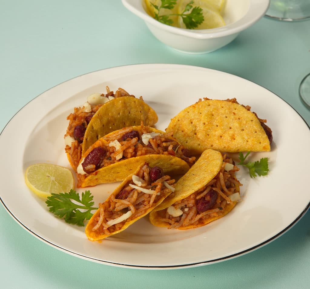 BEAN AND CHEESE RICE TACOS