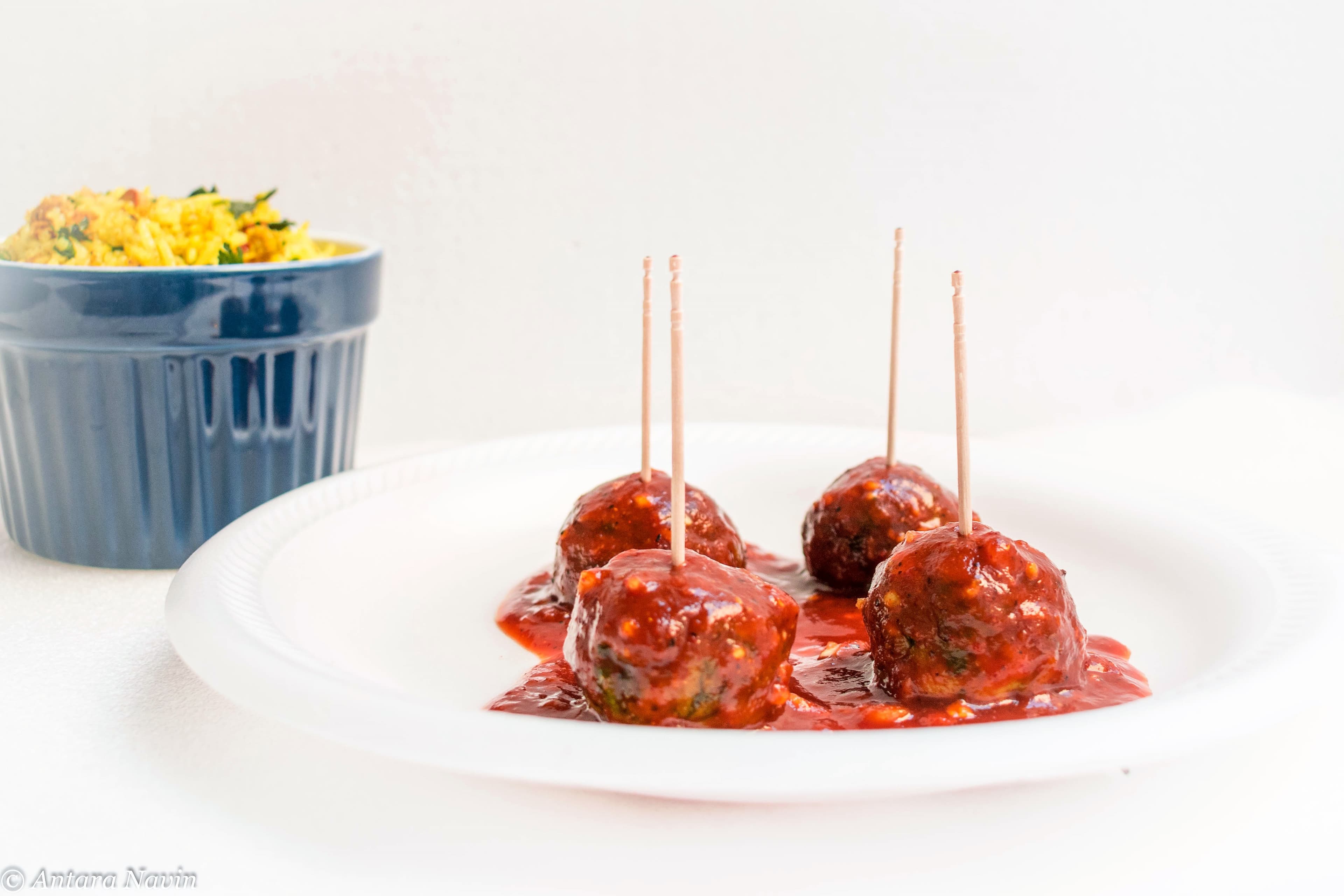 Easy and Delicious Oven Baked Chicken Spinach Meatballs with Spiced Tomatoes Sauce