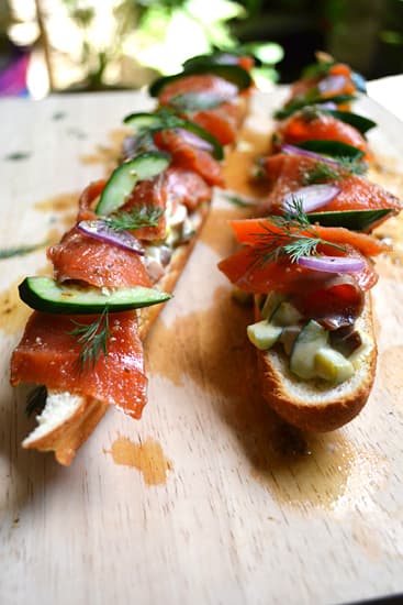 My Home Cured Salmon With Egg & Capers Salad On Crusty Baguette Drizzled With Belvedere Viniagrette