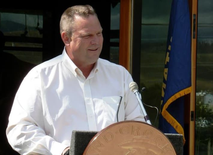 Senator Jon Tester Carries A Suitcase of Meat