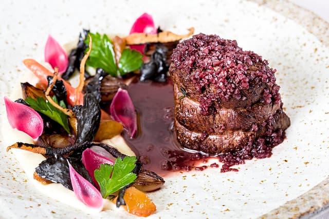 Bison Tenderloin with Roasted Vegetables and Shallot-Red Wine Sauce