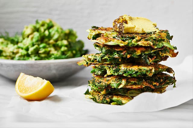 Brussels Sprout and Kale Fritters with Nut Cheese and Avocado, Pea and Mint Smash