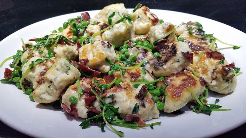Gluten-Free Basil Ricotta Dumplings with Creamy Peas and Pea Shoots