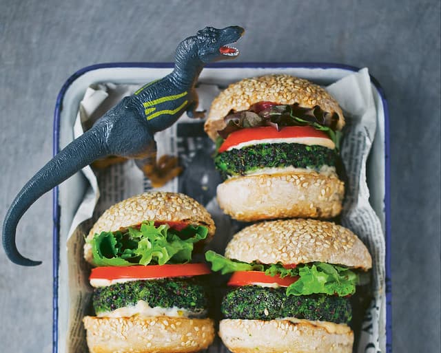Vegetarian Dino Burgers made with spinach, peas, basil, and parmesan