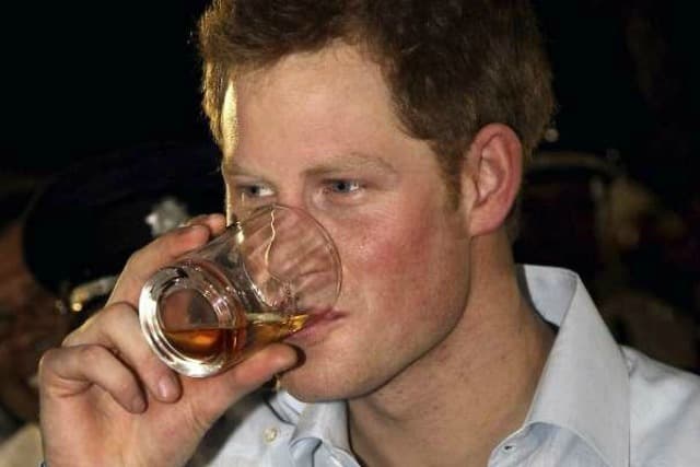 Prince Harry Samples Rum in Belize 