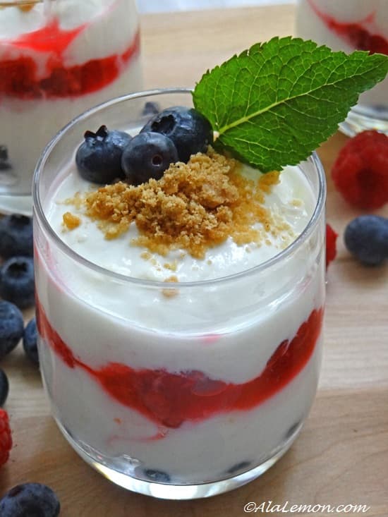 Greek yogurt layer pots with Limoncello-macerated berries