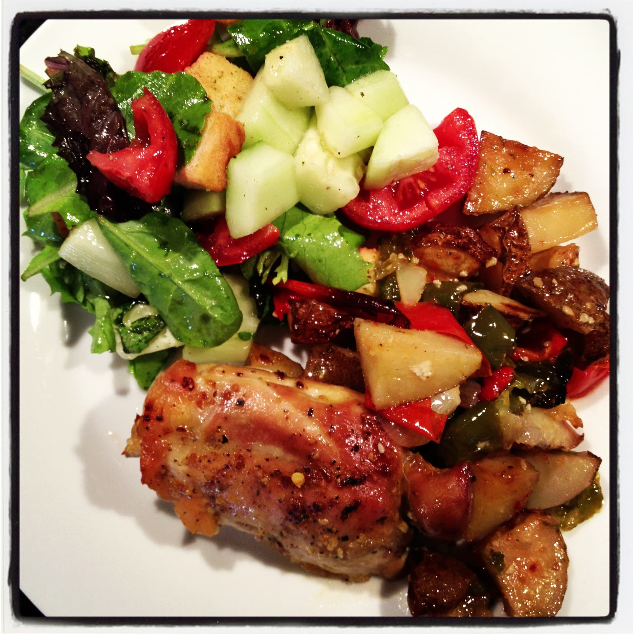 Roasted Chicken Thighs with Potatoes, Peppers and Onions