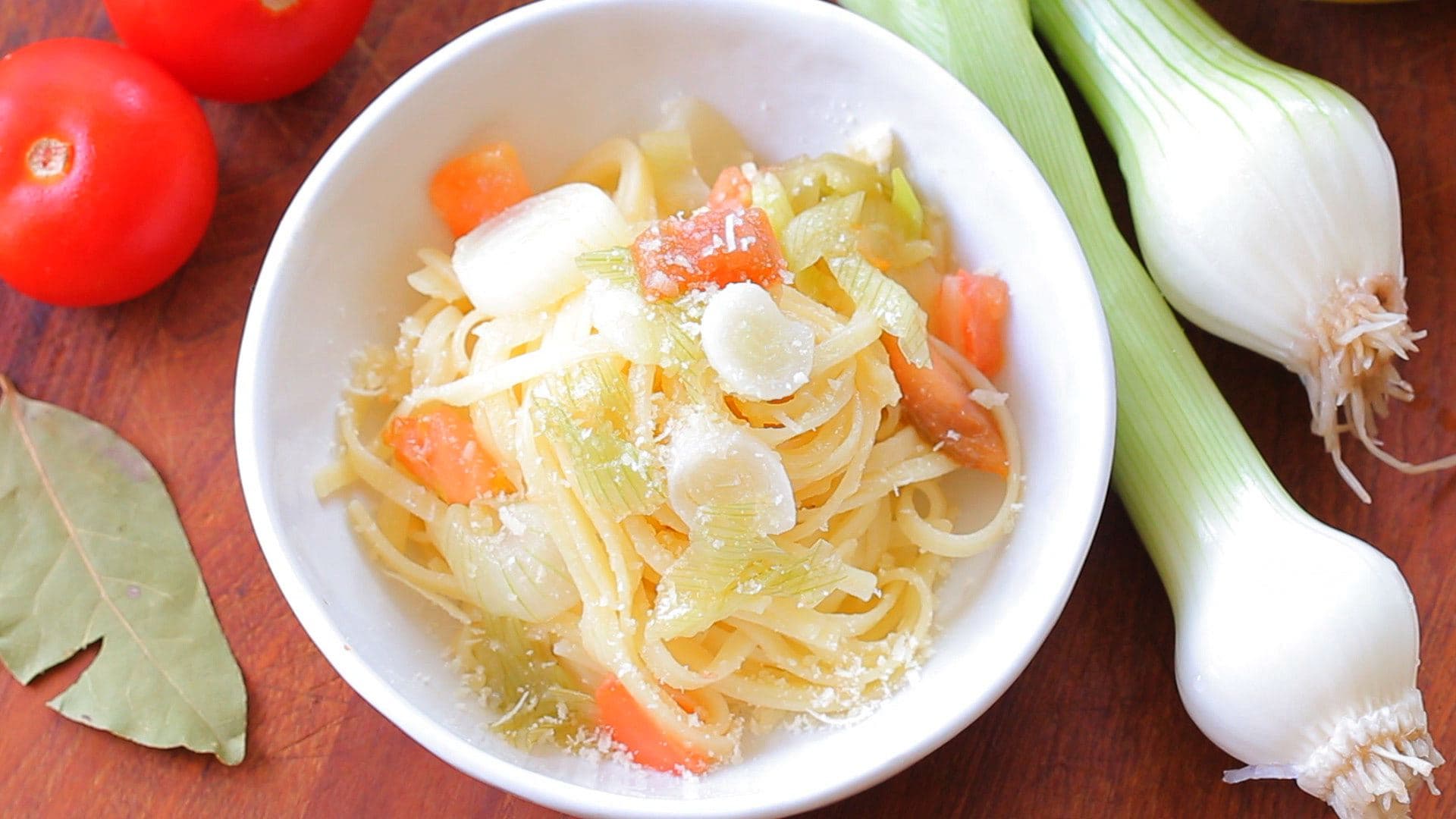 Spring onions and heirloom tomatoes tagliolini pasta