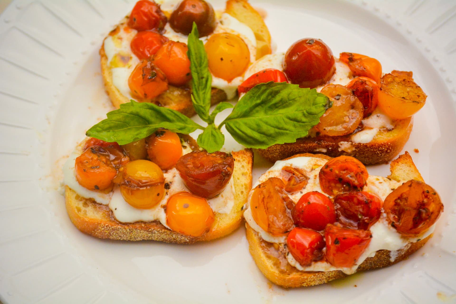 Warmed Red Wine Tomatoes and Ricotta Crostini 