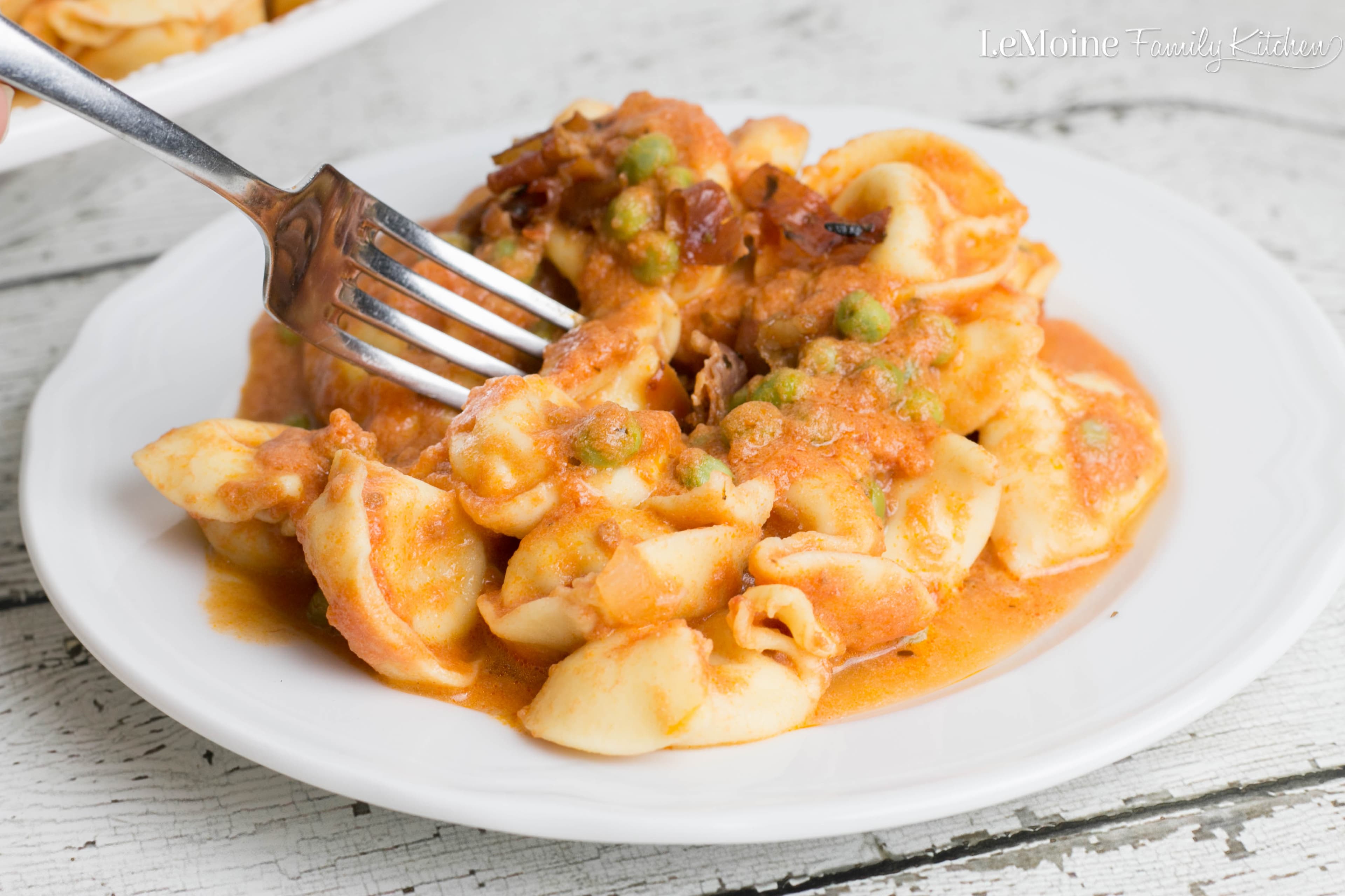 Tortellini in a Tomato Cream Sauce with Peas & Prosciutto