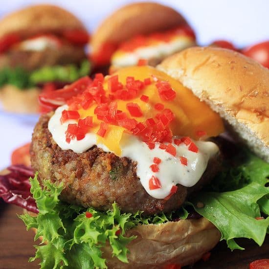 Bean & Veggie Sliders topped with Mango, Chili and Garlic/Herb Dressing