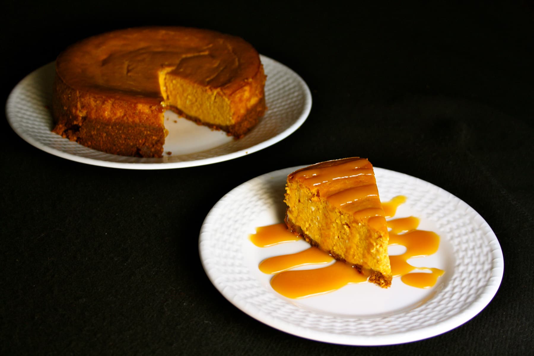 Spiced Pumpkin Cheesecake with Spicy Caramel Sauce