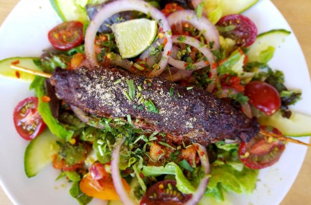 Kachumber salad: lime marinated tomatoes, cucumber, and onions