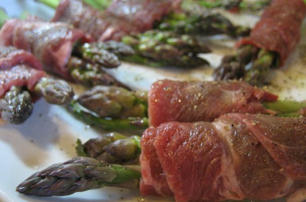 lamb and beef wrapped asparagus