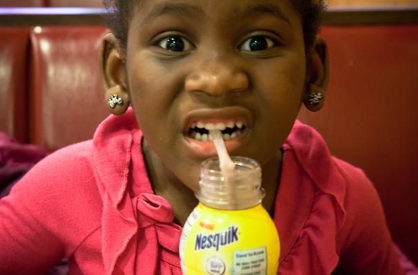 girl drinking chocolate milk