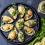 Baked mussels with parmesan cheese, white wine and herbs